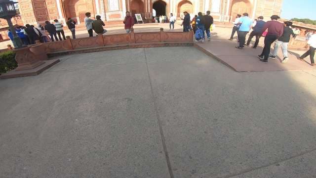 Tourists Exploring the Historic Taj Mahal Complex in Agra India