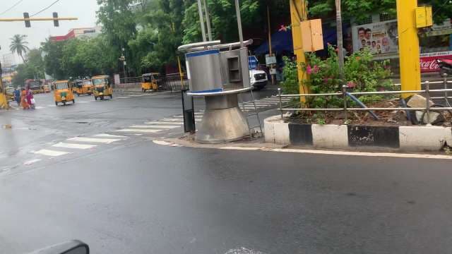 Busy City Street with Auto Rickshaws in Chennai India