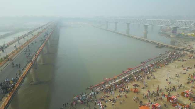 Aerial View of Kumbh Mela Pilgrims Near Prayagraj Bridges