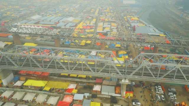 Aerial View of Massive Kumbh Mela Tent City and Railway Bridges
