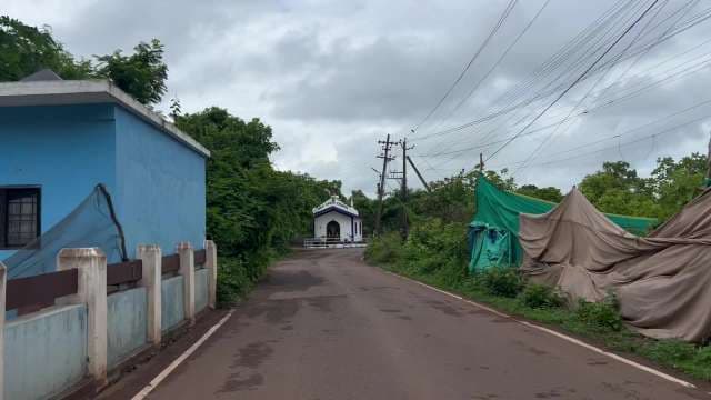 Quiet Rural Road Leading to Holy Cross Chapel Goa