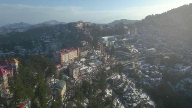 Aerial View of Snow-Covered Shimla Hill Station in Morning Mist