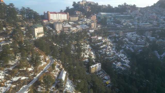 Snow-Covered Hillside Cityscape of Shimla India Aerial View