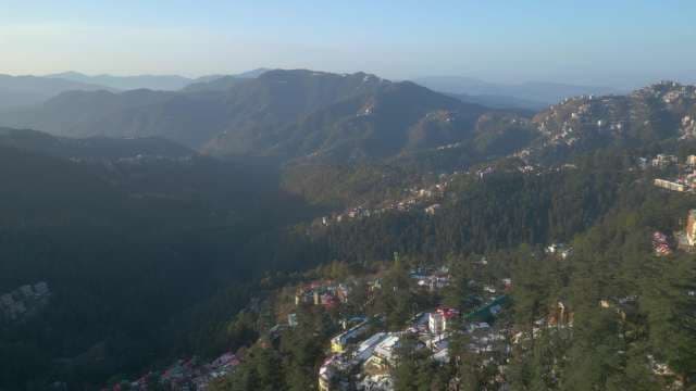 Aerial View of Scenic Hill Station Town in Misty Mountains