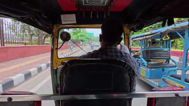 POV Ride in an Indian Auto Rickshaw Through City Traffic