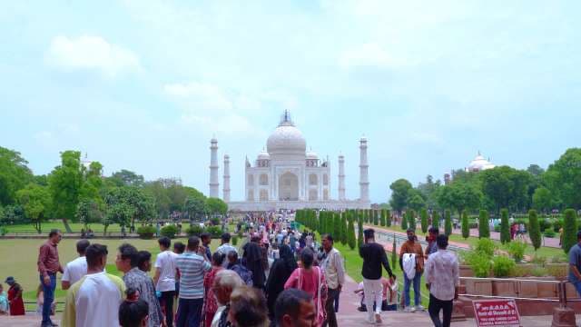 Tourists Visiting the Majestic Taj Mahal in Agra India