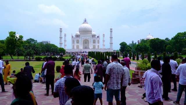 Tourists at the Taj Mahal Landmark in Agra India
