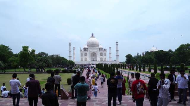 Tourists Visiting the Taj Mahal Landmark in Agra India