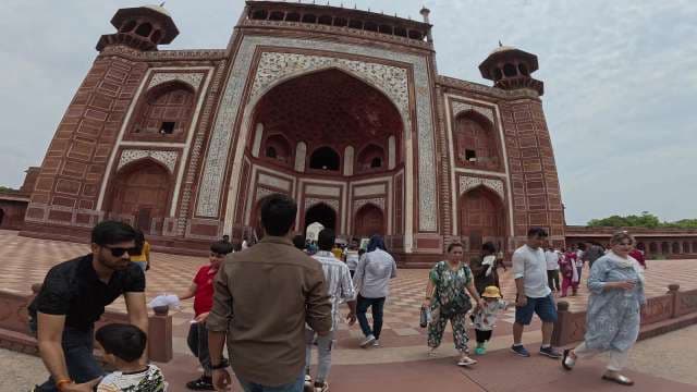 Tourists Visiting the Great Gate of Taj Mahal in Agra