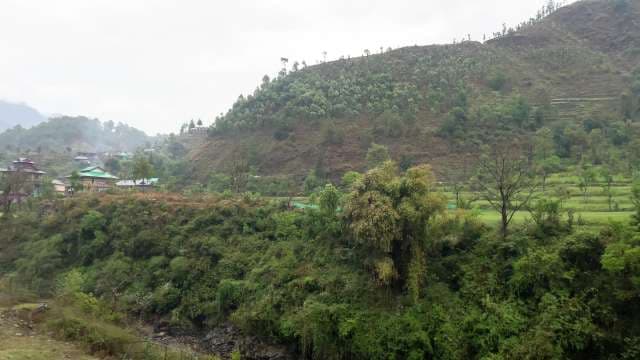 Scenic Lush Green Hills and Rural Village in Himalayan Mountains