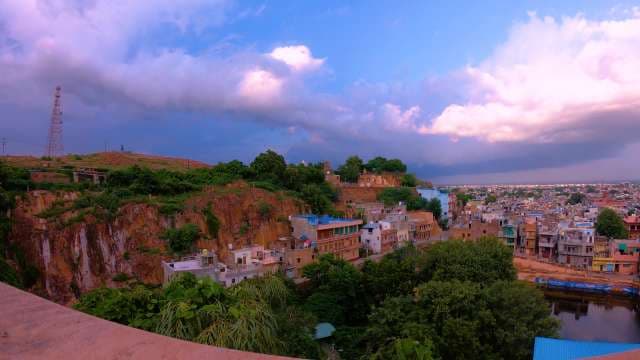Scenic View of Jodhpur City and Rocky Hills Under Sunset Sky