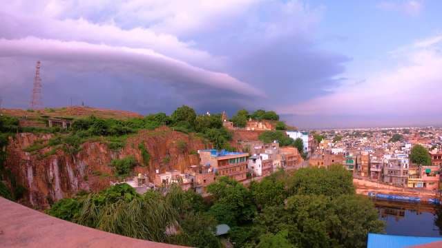 Storm Clouds Over Rocky Indian Cityscape