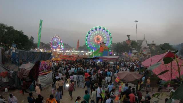 Vibrant Indian Carnival with Glowing Ferris Wheels and Bustling Crowds