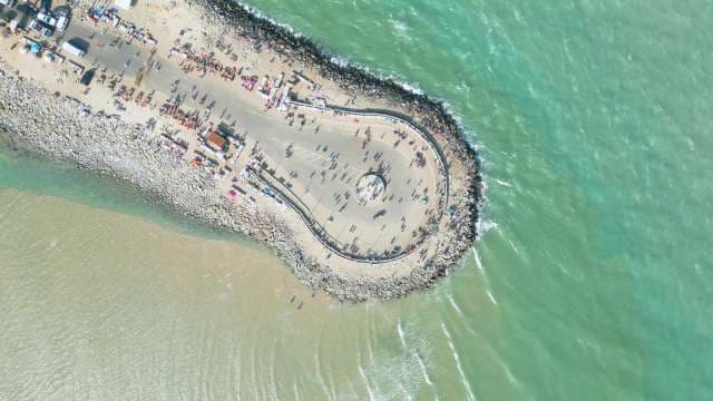Aerial Top-Down View of Busy Coastal Pier and Market