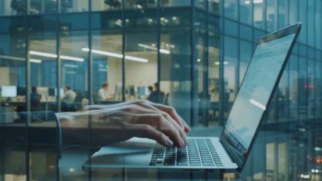 Professional Typing on Laptop with Corporate Office Double Exposure