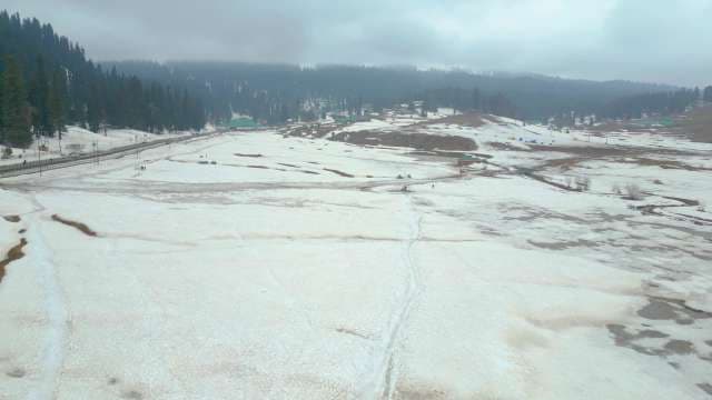 Aerial View of Snow-Covered Valley in Gulmarg Mountains