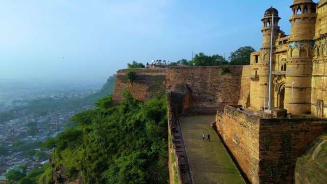 Majestic Gwalior Fort Architecture Overlooking Misty City in India