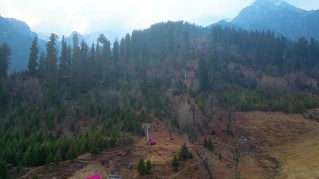 Scenic Aerial View of Mountain Ropeway and Pine Forest in Manali