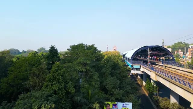 Modern Elevated Metro Station in Delhi Surrounded by Greenery