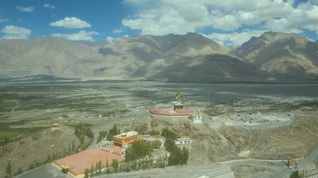 Aerial View of Maitreya Buddha Statue and Diskit Monastery, Ladakh