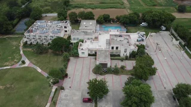 Aerial View of Luxury Resort with Solar Panels