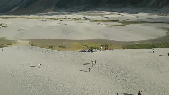 Aerial View of Tourists Exploring Hunder Sand Dunes in Ladakh