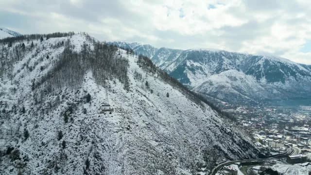 Aerial View of Snowy Himalayan Mountains and Srinagar Valley