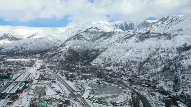 Aerial View of Snowy Srinagar Town in Himalayan Valley