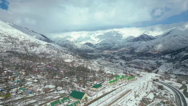 Aerial View of Snowy Mountain Village in Srinagar Valley