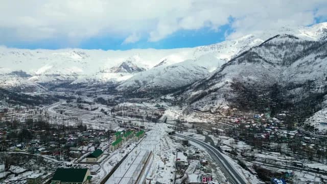 Aerial View of Snowy Mountain Town and Railway Valley, Kashmir