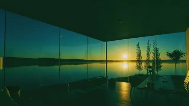 Sunset Lake View From Modern Luxury Glass Living Room