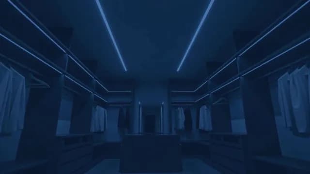Modern Luxury Walk-in Closet with Blue LED Accent Lighting