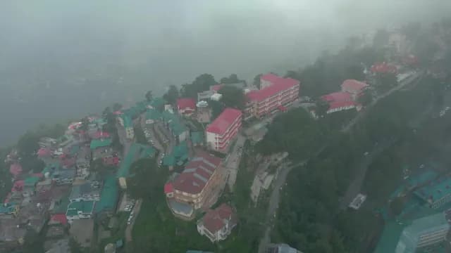 Aerial View of Misty Shimla Hill Station with Colorful Buildings