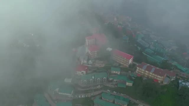 Aerial View of Foggy Mountain Town Buildings in Shimla India