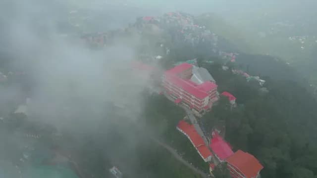 Aerial View of Misty Hill Station Buildings in Shimla India