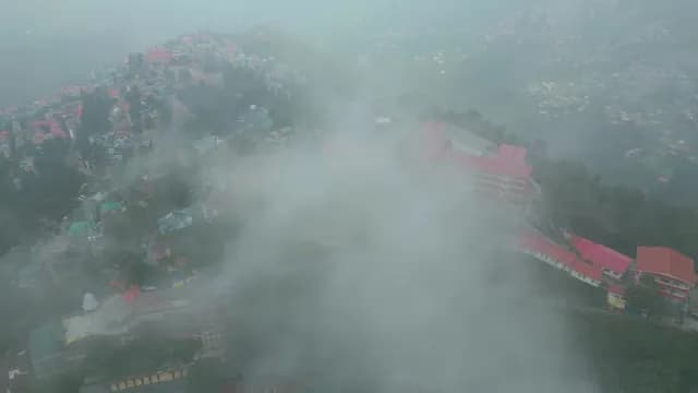 Aerial Drone Shot of Misty Mountain Town in Shimla India