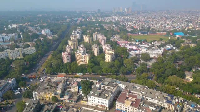 Aerial View of Delhi Cityscape with Residential Buildings and Greenery