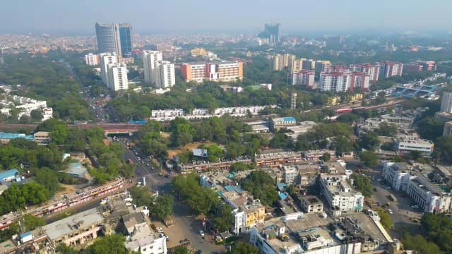 Aerial Panorama of New Delhi Cityscape with Urban Traffic and Greenery