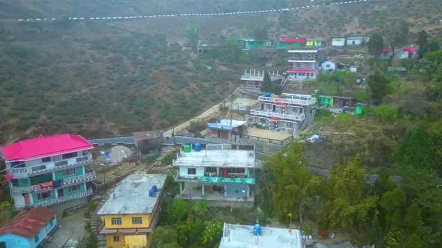 Himalayan Hillside Village with Terraced Tea Plantations and Colorful Buildings, Darjeeling