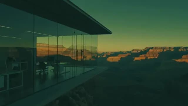 Modern Glass Office Overlooking Grand Canyon Sunset