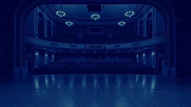 Empty Grand Theater Stage View with Moody Blue Interior Lighting