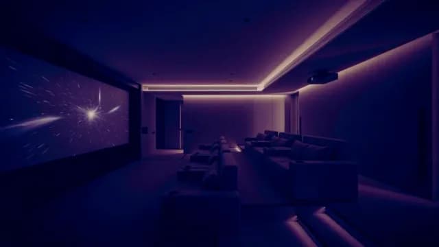Modern Home Cinema with Luxury Seating and Purple LED Lighting
