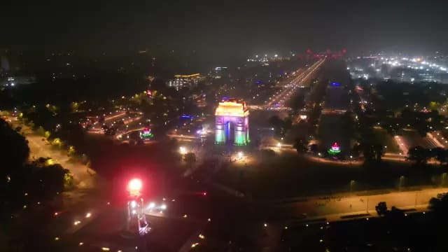 Aerial Night View of India Gate with Tricolor Illumination