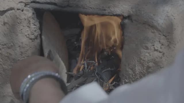 Traditional Flatbread(Roti) Baking in Clay Wood-Fired Chulha