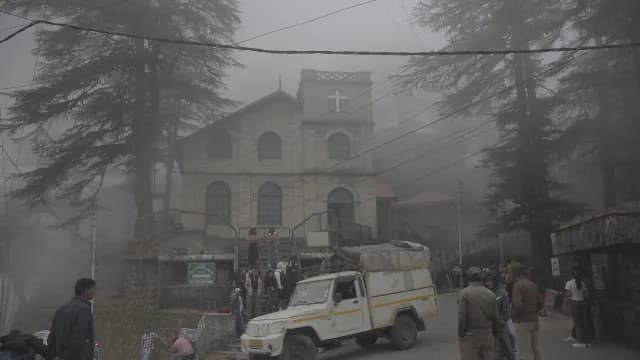 Misty Kellogg Memorial Church and Road Traffic in Mussoorie India