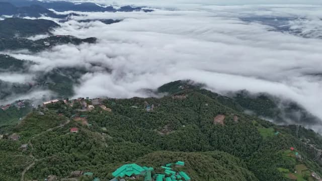 Aerial View of Foggy Mountains and Lush Green Hillside Town, Mussoorie