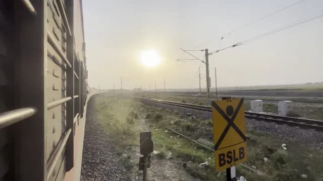 Golden Hour Journey View from an Indian Passenger Train Near Ghaghra River in Gonda