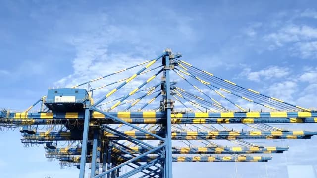 Industrial Blue and Yellow Ship-to-Shore Port Crane Under Blue Sky in Nellore, Andhra Pradesh