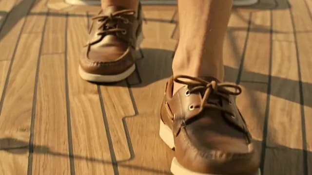 Man Wearing Leather Boat Shoes Walking on Luxury Yacht Deck
