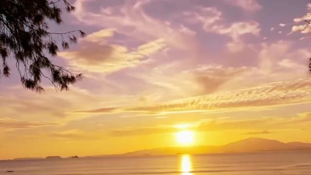 Golden Sunset Over Coastal Mountain Landscape